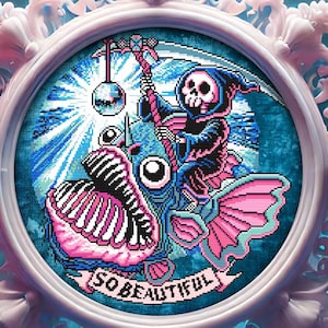 May include: A framed cross-stitch design featuring a skeleton riding a fish with the text "SO BEAUTIFUL". The design is set against a blue and white background with a pink and white fish.