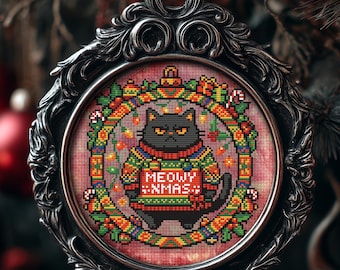May include: A decorative Christmas ornament with a black cat wearing a festive sweater that says "MEOWY XMAS." The ornament is framed in an ornate, dark silver-colored border and hangs from a silver loop. The background is a blurred image of a Christmas tree.
