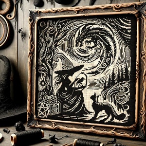May include: Black and white cross-stitch embroidery framed in a dark wood frame. The design features a witch holding a book and a cat. The background is a swirling sky with trees.