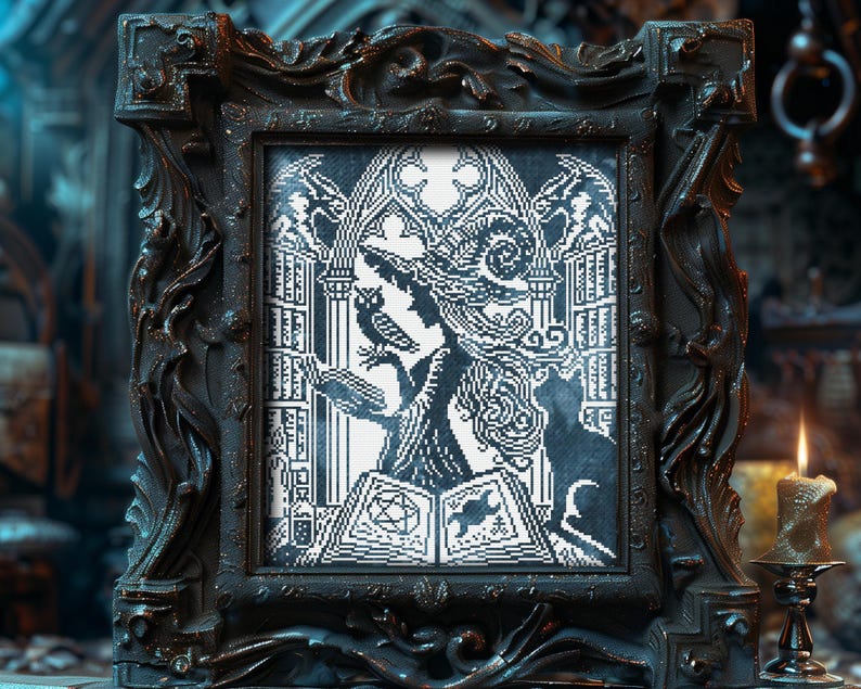 May include: Black framed cross-stitch art featuring a witch with an owl and a cat, reading from a spell book. The gothic-style artwork is in black and white, with intricate details. The frame is dark brown with ornate carvings, and a lit candle is in the background.