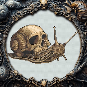 May include: A cross-stitch pattern of a snail with a skull for a shell. The snail is brown and the skull is white with black eye sockets.