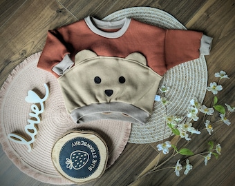 Cute oversized sweater with teddy face, bear face, neutral, in pastel shades for babies, size 50-80