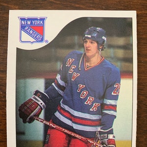 Carte de hockey O-Pee-Chee 1985-86 TOMAS SANDSTROM #123 Rookie Rangers de New York NRMT