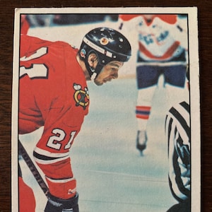 Cartão de hóquei O-Pee-Chee 1977-78 STAN MAKITA #195 Chicago Black Hawks EX+