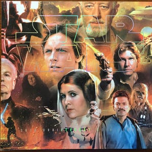 May include: A white ceramic mug with a black handle and the text "But First, Coffee" in a bold, black font. The mug is set against a blurred background, highlighting its simple design.