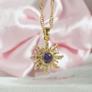 tangled necklace from gemstones with metal flower 12243097 Stock