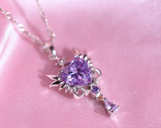 Enchanting Anime Inspired Necklace - Unique Purple Heart Pendant with Wing Details and Swinging Drop