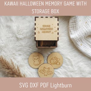 May include: A light-colored wooden memory game set featuring a square storage box with the text KAWAI HALLOWEEN MEMORY engraved on the front. Three circular wooden game pieces are displayed in front, each showing engraved illustrations of a cat, a bat, and a witch.
