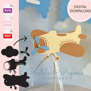Puede incluir: Una descarga digital imprimible de una manualidad de avión de papel. El avión es amarillo con detalles marrones y una hélice azul. El diseño incluye una nube y un avión más pequeño.