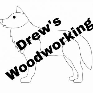 May include: Line drawing of a wolf with the text "Drew's woodworking" in black diagonally across the image. The wolf is in profile, with a pointed ear, a fluffy chest, and a long tail. The image is on a white background.