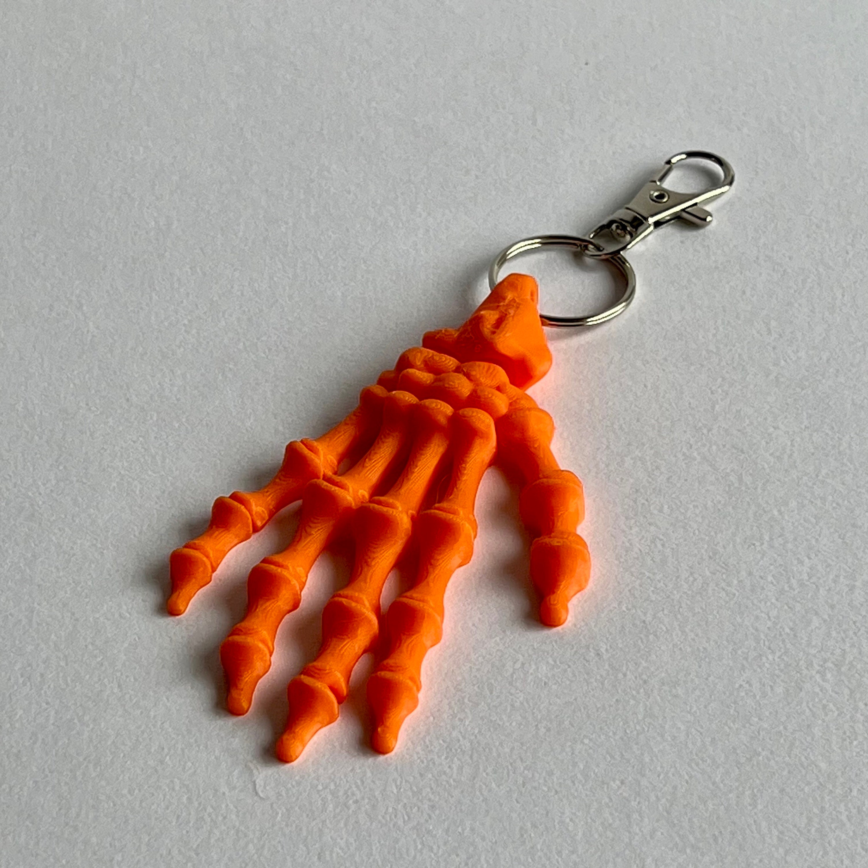 Realistic Articulating Skeleton Hand Keychain - Spooktacular