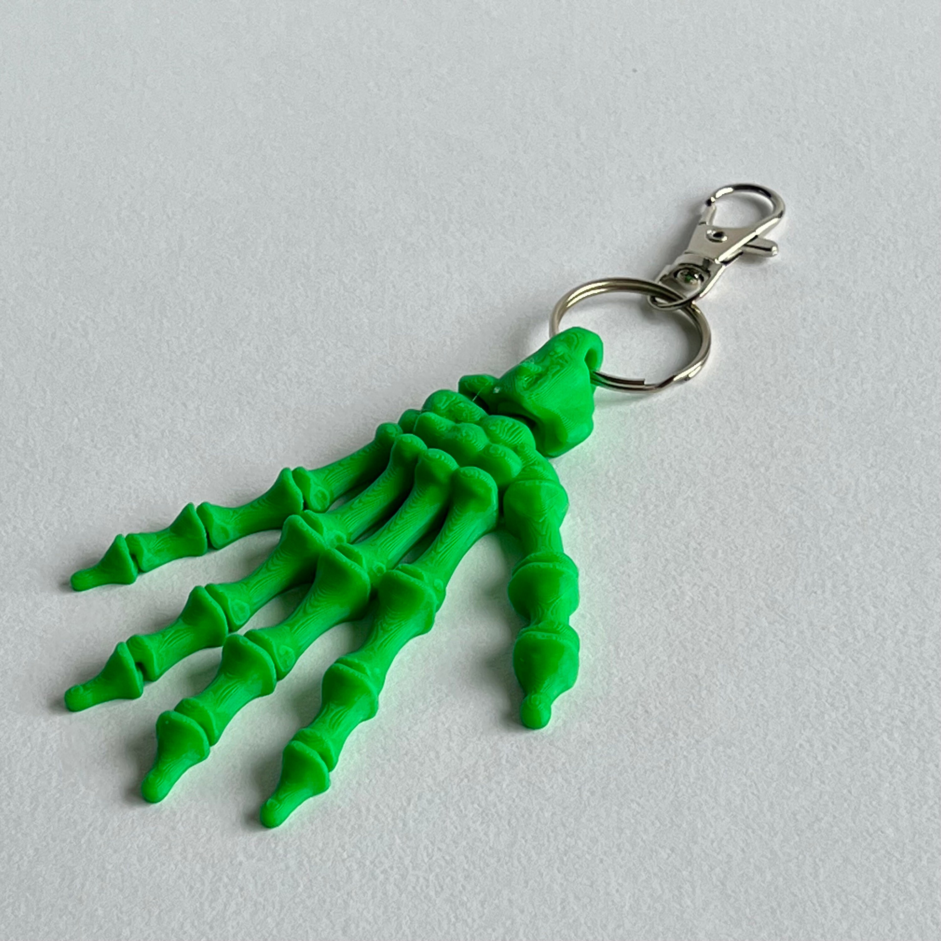 Realistic Articulating Skeleton Hand Keychain - Spooktacular