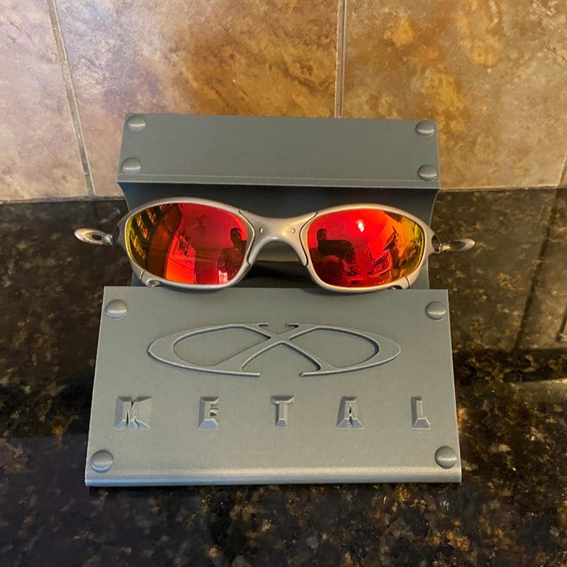 Vintage Oakley Metal Stand