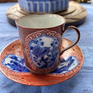 Antique Japanese Kutani Tea Cup and Saucer
