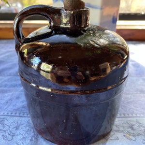 Antique Brown Stoneware Jug with Wooden Stopper