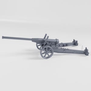 以下が含まれることがあります： 長い砲身、車輪、詳細な台車を備えた灰色のモデルの大砲。 大砲は、おそらく展示または趣味のプロジェクト用のミニチュア レプリカです。 デザインは、歴史的な軍事装備を彷彿とさせます。
