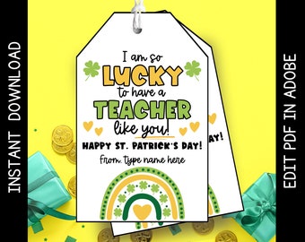 May include: A printable St. Patrick's Day gift tag with a green shamrock and rainbow design. The text reads "I am so lucky to have a teacher like you! Happy St. Patrick's Day! from. type name here"