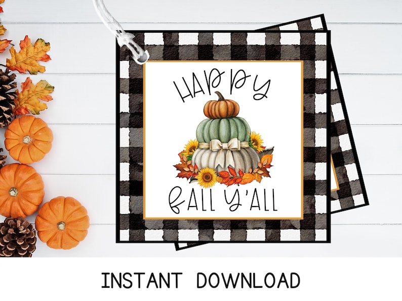 May include: A printable gift tag with a black and white buffalo plaid background. The tag features a watercolor illustration of three pumpkins stacked on top of each other. The pumpkins are decorated with a white ribbon and sunflowers. The text "Happy Fall Y'all" is written in black script font.