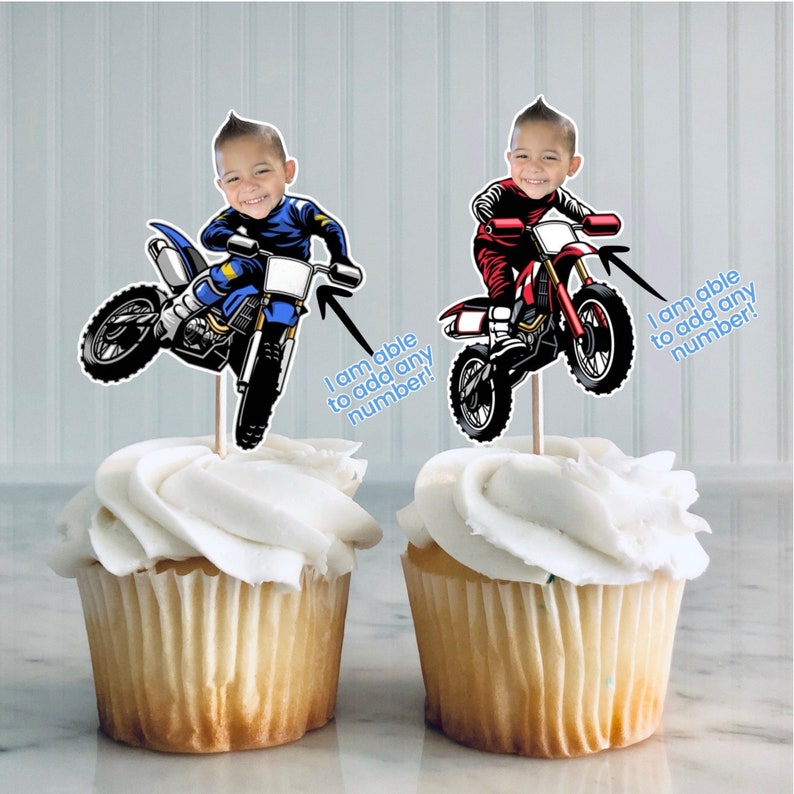May include: Two cupcake toppers featuring a cartoon image of a child riding a dirt bike. The toppers are printed with the text "I am able to add any number!"