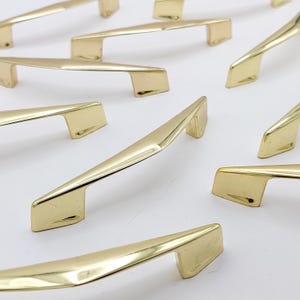 May include: A rustic wooden sign with the text "Welcome to our home" in white lettering. The sign features a distressed finish and a simple, inviting design, perfect for front door decor.