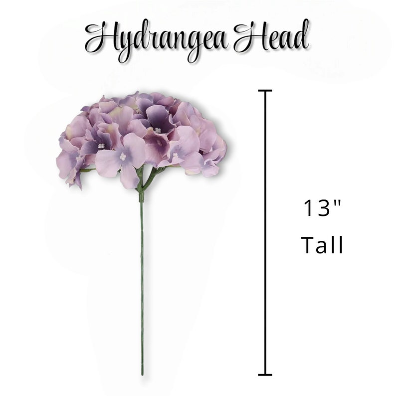 May include: A purple hydrangea head flower on a thin green stem. The text Hydrangea Head is displayed above the flower, and a vertical line with the text 13" Tall is positioned to the right, indicating the total height of the floral stem.