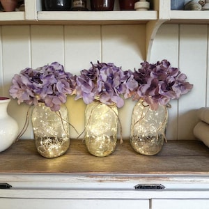Clear Mason Jars With String Lights & Hydrangea Flowers, Romantic Theme, Home And Wedding Decor, Wedding Table Centerpiece, Cozy Home Decor