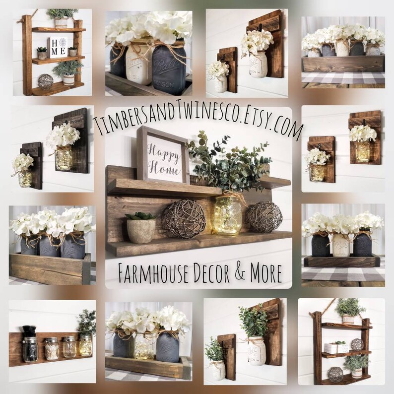 May include: A collection of farmhouse style wall decor featuring shelves, mason jars, and greenery. The shelves are made of rustic wood and have a distressed finish. The mason jars are decorated with white flowers and twine. The greenery is a mix of eucalyptus and succulents. The sign reads "Happy Home".