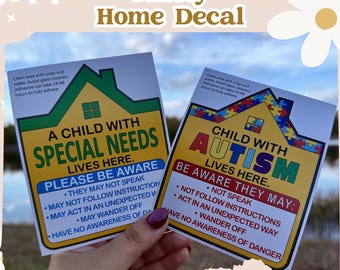 May include: Two rectangular safety home decals. One reads "A Child With Special Needs Lives Here." The other reads "Child With Autism Lives Here." Both have a house graphic and list potential behaviors. The text "Please Be Aware" is also included.