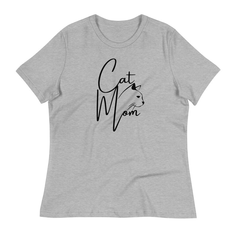 May include: A heather grey t-shirt with a black graphic that says "Cat Mom" with a stylized cat head silhouette.