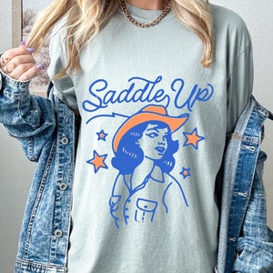 Saddle Up Cowgirl Oversized Vintage Tee, Cowgirl Shirt, Rodeo Cowgirl Shirt, Rodeo Shirt, Country Concert Outfit, Comfort Colors Western Tee