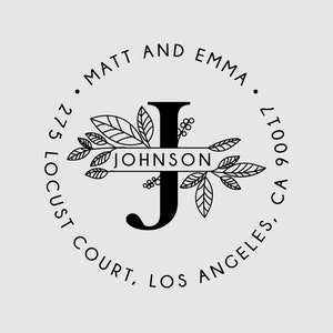 May include: Black and white wedding monogram featuring the letter J, surrounded by floral designs and the text "MATT AND EMMA", "JOHNSON", "275 LOCUST COURT, LOS ANGELES, CA 90017".