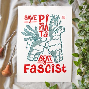 Save A Piñata Beat A Fascist - linoleum block print on sturdy 220gsm off white art paper - size A4 - Pressed by hand