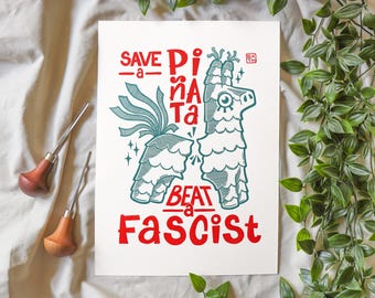 Save A Piñata Beat A Fascist - linoleum block print on sturdy 220gsm off white art paper - size A4 - Pressed by hand