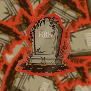 Op de afbeelding: Een sticker met een grafsteendesign met de letters "BRB" in het wit. De grafsteen is grijs met zwarte details, omgeven door oranje en bruin blad. De achtergrond heeft een herhalend patroon van hetzelfde grafsteendesign.