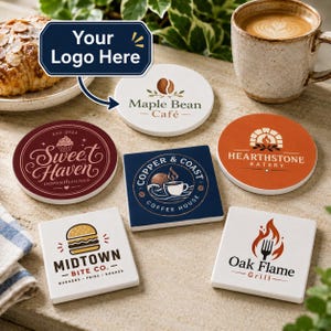 May include: A collection of six round and square drink coasters featuring various printed logos including Maple Bean Café, Sweet Haven, Copper & Coast Coffee House, Hearthstone Eatery, Midtown Bite Co., and Oak Flame Grill, displayed on a stone surface.