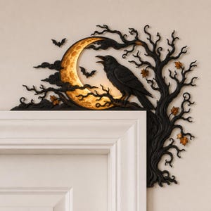Gothic raven moon door frame topper featuring black crow, twisted spooky tree, glowing crescent moon, bats and fall leaves for Halloween decor.