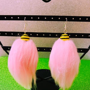 Killer known cotton candy cocoon earrings.