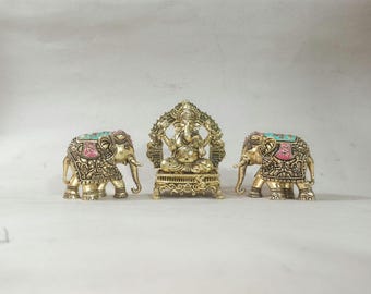 Brass Ganesha Statue with Elephants: Colorful Home Decor Idol