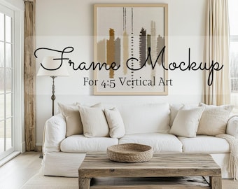 May include: A living room setting with a white sofa, a wooden coffee table, and a framed artwork. The artwork displays vertical abstract shapes in neutral tones. The text "Frame Mockup For 4:5 Vertical Art" is visible.