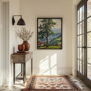 May include: A wooden console table with a brown top and black metal legs. The table is decorated with a vase of dried branches and a painting of a green tree in a landscape setting.