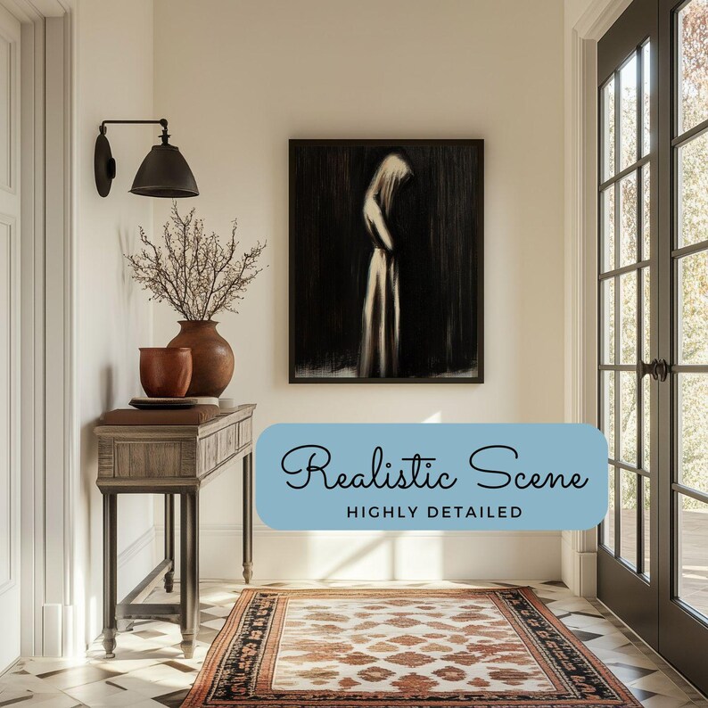 May include: A light wood console table with a brown rug in front of it. A black framed painting of a woman in a white dress hangs on the wall above the table. A black wall sconce with a black shade is mounted on the wall to the left of the painting. The table has a vase with dried branches on it and a brown ceramic bowl.