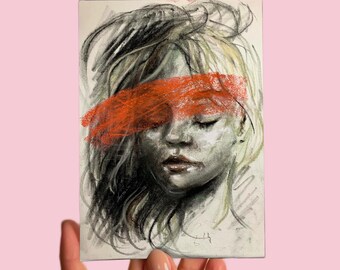 May include: A black and white charcoal drawing of a person's face with a bright orange stripe covering one eye. The person has their eyes closed and is looking down.