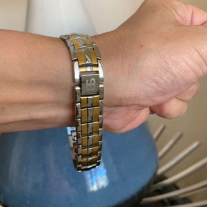 Bellissimo braccialetto magnetico in acciaio chirurgico 4 elementi ripristinano l'equilibrio rinnovano l'energia potenziano la calma gioia ottimo regalo di festa per uomini e donne