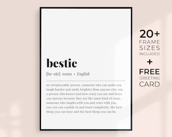 May include: A framed wall art print featuring a dictionary-style definition of the word bestie. The text reads: bestie [be-stē] noun • English, an irreplaceable person. someone who can make you laugh harder and smile brighter than anyone else can.