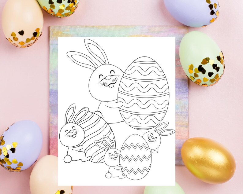 May include: A black and white coloring page featuring four bunnies holding Easter eggs. The bunnies are all smiling and have long ears. The eggs are decorated with stripes and wavy lines.