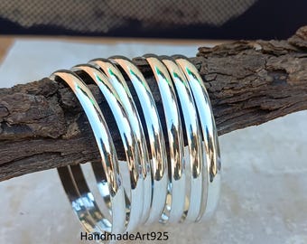 Handmade Sterling Silver Bangle Set: 7-Day Stacking Bangles