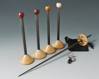 Fast support spindle &quot;Tilda&quot; with interchangeable yarn spools and adjustable weight