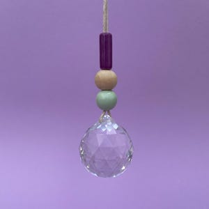 Suncatcher / sun catcher purple wood mint with 3 cm glass crystal, ceramic & wooden beads, handmade