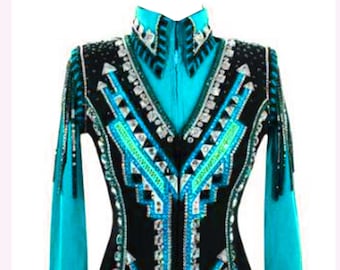 May include: A black and turquoise show jacket with a geometric design and rhinestones.