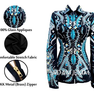 May include: Black show jacket with a teal and silver design featuring glass appliques. The jacket has a zipper closure and is made of stretch fabric. The zipper is a YKK metal zipper.